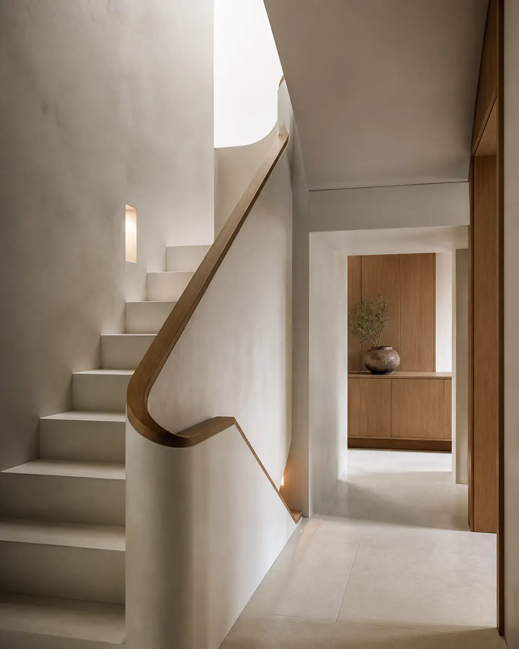 Concept study of a plaster stair and hand-finished oak rail in a modern home